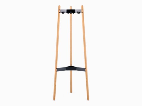 A front view of the Hudson Coat Stand with oak dowel legs with black metal supports.