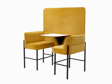 Two-seat bar-height Hue Booth with Screen, upholstered in yellow velvet with black legs and white table top, viewed from an angle.