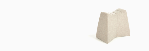 A beige NaughtOne Pinch Stool, viewed at an angle. A beige NaughtOne Pinch Stool, viewed at an angle.