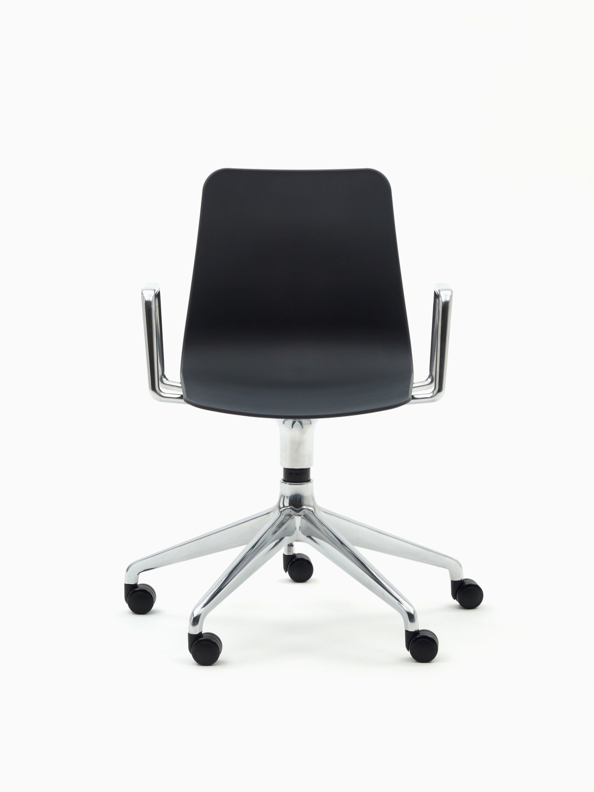 naughtone, The Polly chair fundamentally provides a very comfortable ergonomic seat with as little visual detail as possible.