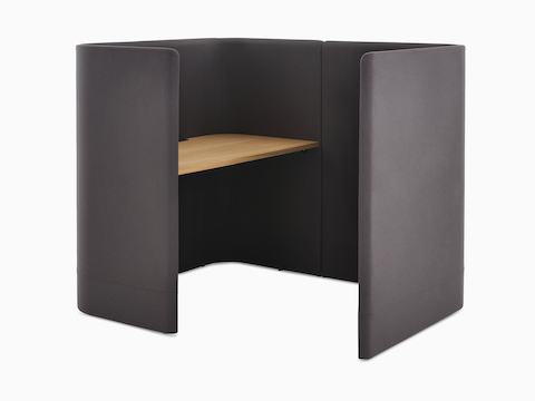 Three-quarter angle of Pullman Desk Pod upholstered in grey fabric and oak top, with screen to the right.