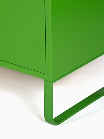 A close-up view of a green naughtone Sideboard Storage base.