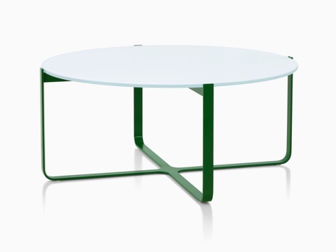 Table basse Trace circulaire avec plateau orné d’une peinture sous verre et piètement en métal de couleur vert feuille.