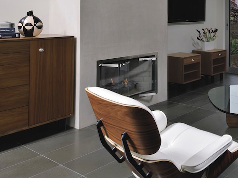 Nelson Basic Cabinet Series modular storage pieces of various sizes near a fireplace in a residential setting. 