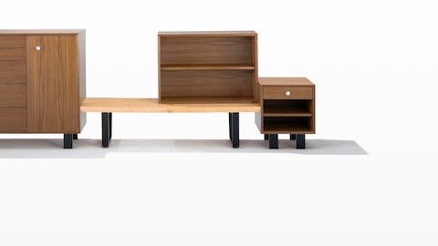 Open and closed Nelson Basic Cabinet Series storage modules, shown with a Nelson Platform Bench.