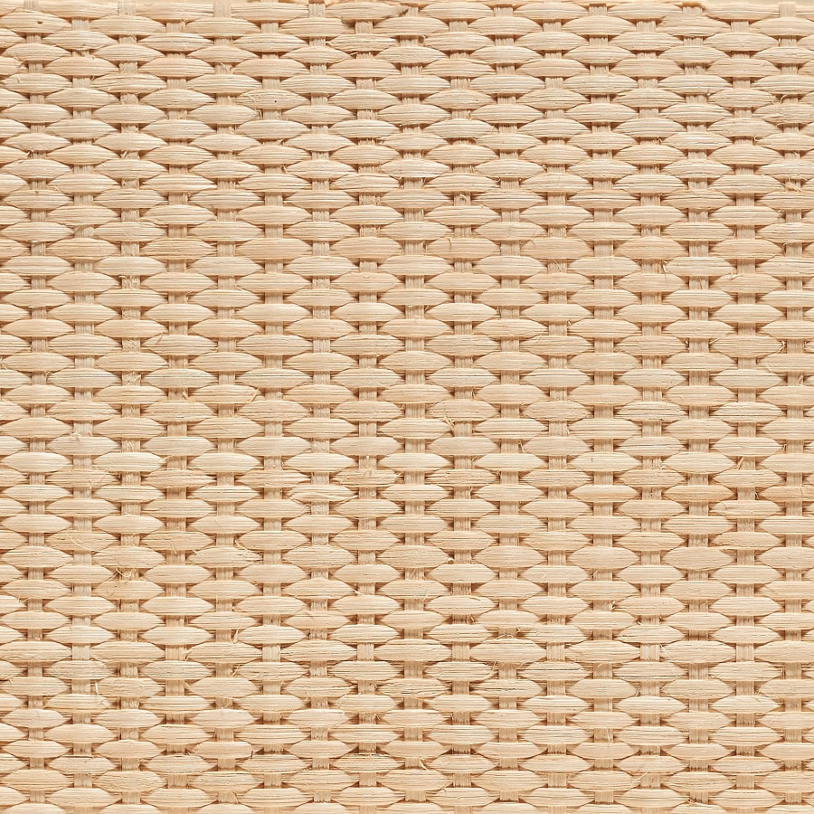 A close-up view of the Natural Cane material swatch.