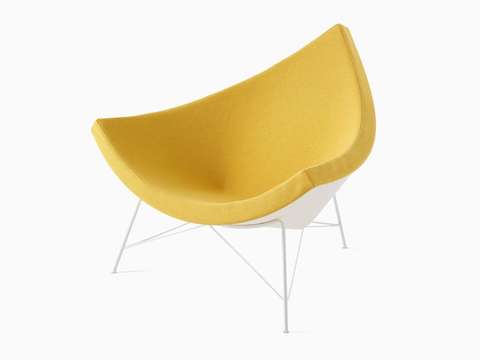 A Nelson Coconut Lounge Chair in a yellow Mode fabric viewed from a 45-degree angle.