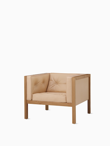Nelson Cube Armchair in oak and leather. Select to go to the Nelson Cube Armchair product page.