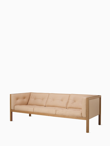 Nelson Cube Sofa in oak and leather. Select to go to the Nelson Cube Sofa product page.