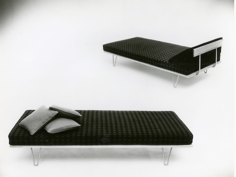 A vintage black-and-white photo of two Nelson Daybeds, one in the bed position and one in the lounge position. A vintage black-and-white photo of two Nelson Daybeds, one in the bed position and one in the lounge position.