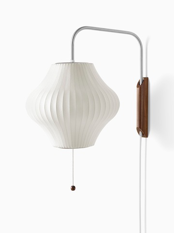 A white wall sconce.