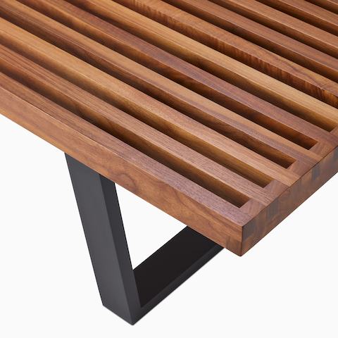 A close up detail of the slatted top of the Nelson Platform Bench.