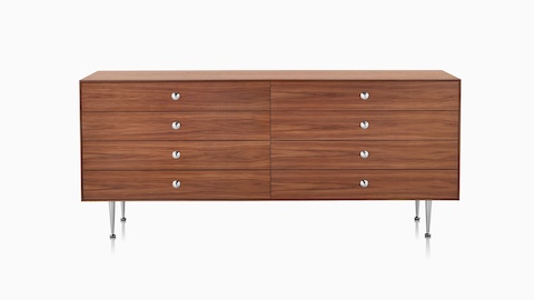 A Nelson Thin Edge double dresser with eight drawers, silver knobs, and a medium finish. 