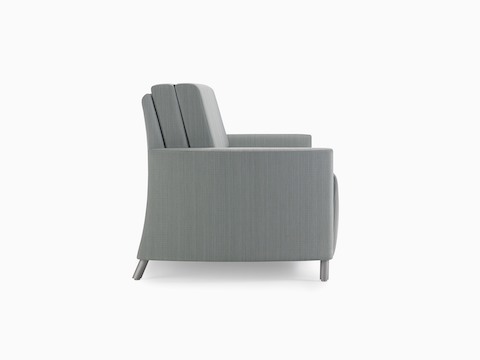A side view of a Pamona Flop Sofa in gray textile with metal legs.