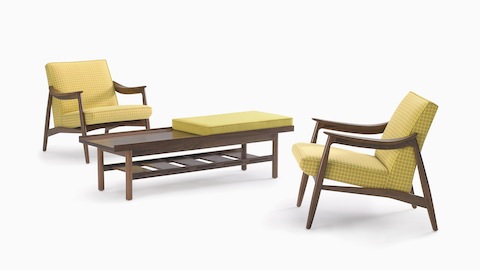 Aspen lounge chairs in yellow textile and walnut base with Tamarack Table and Bench.