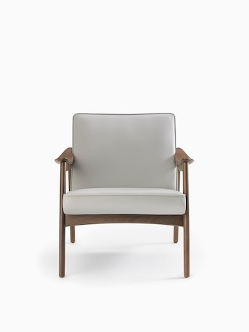An Aspen Lounge Chair in a gray textile with walnut base and arms.