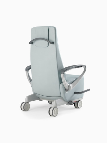 Nemschoff Ava Recliner with arcade back in a light blue upholstery, viewed from the back angle.