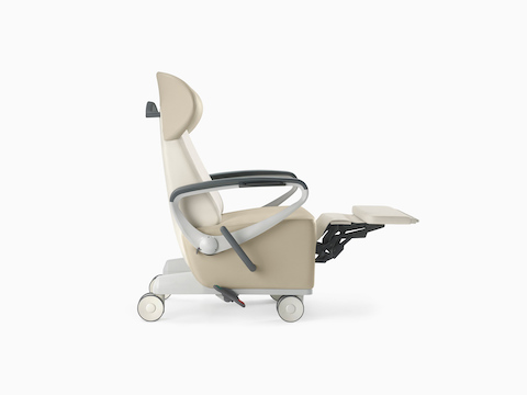 Nemschoff Ava Recliner with wingback in two beige upholsteries with the footrest extended.