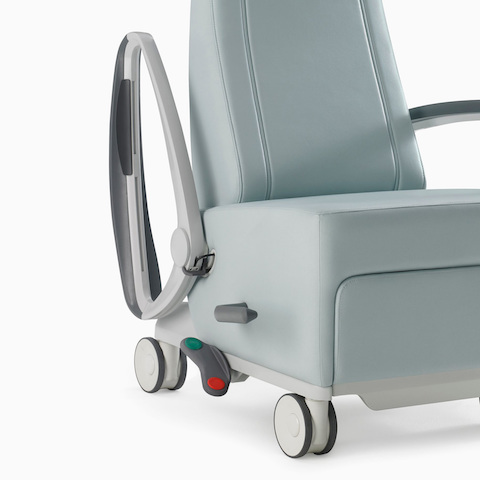An Ava Recliner with Slate Gray urethane arm caps, Folkstone Gray powder-coated aluminum arms, and Arcadeback style headrest.
