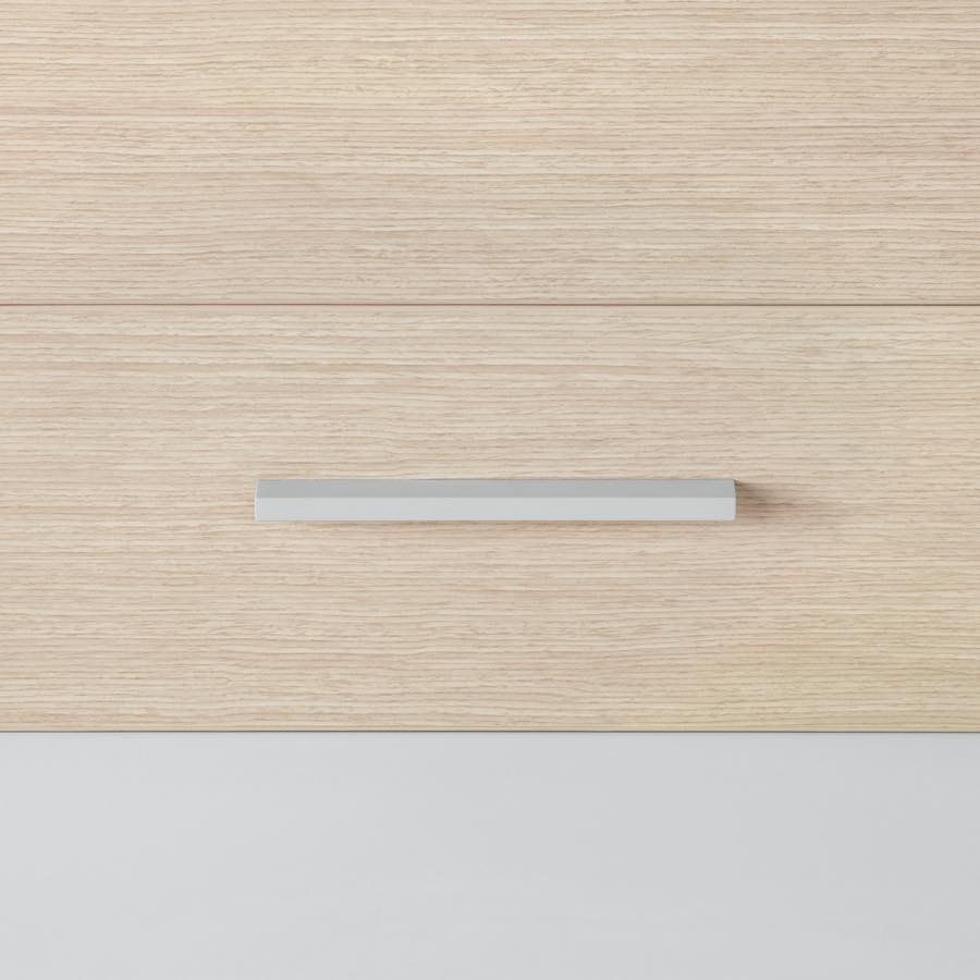 A close-up view of the bar pull in a light gray finish.