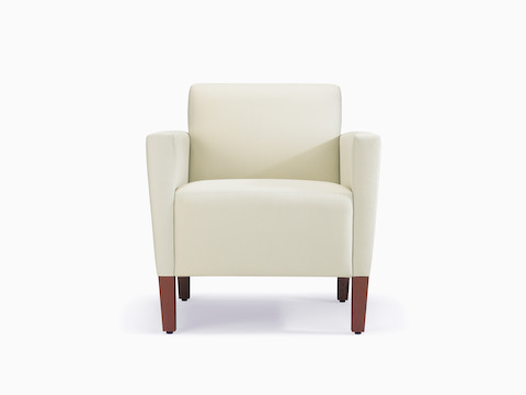 A front view of a Brava Classic Lounge Chair with white textile and upholstered arm caps.