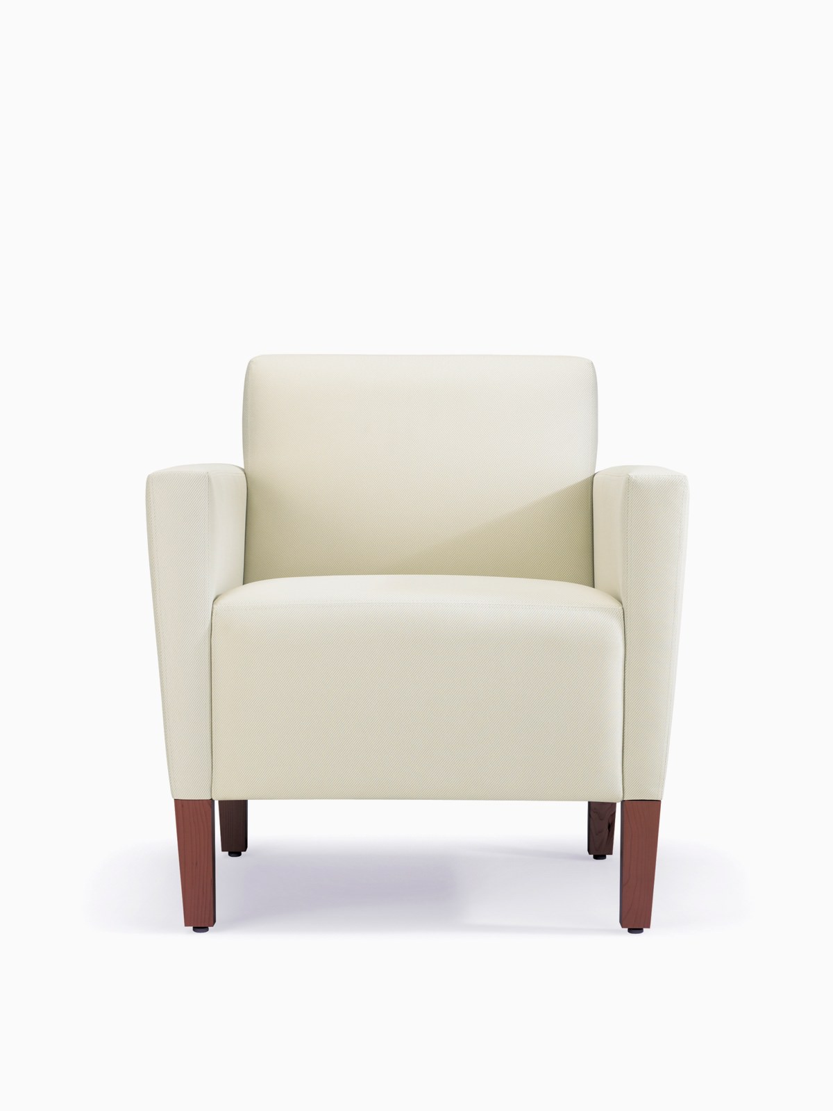 A front view of a Brava Classic Lounge Chair with white textile and upholstered arm caps.