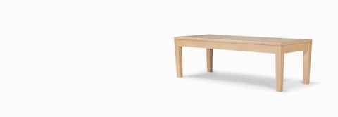 A Brava Table in solid maple with a light finish. A Brava Table in solid maple with a light finish.