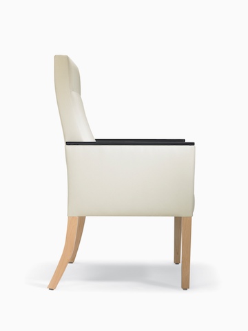 A side view of a Brava 862 high-back patient chair in white textile with maple legs and urethane arm caps.