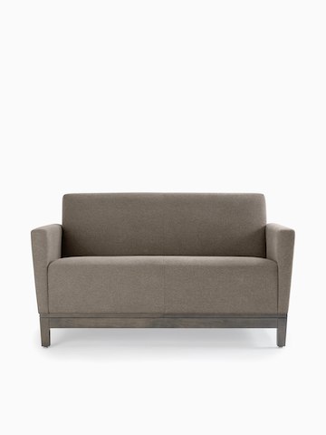 Front view of a gray Brava Platform Lounge System two-seat sofa with upholstered arms on a wood base.