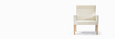 A front view of a Brava 862 Plus Chair with high-back in white textile with upholstered arms and maple base.