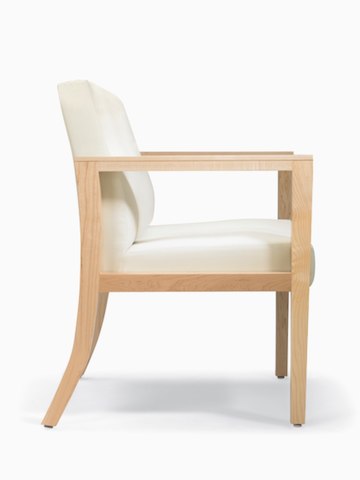 A side view of Brava 863 plus chair in white textile with open maple wood arms.