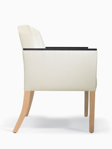 A side view of Brava 862 Plus Chair in white textile with urethane arm caps and maple legs.