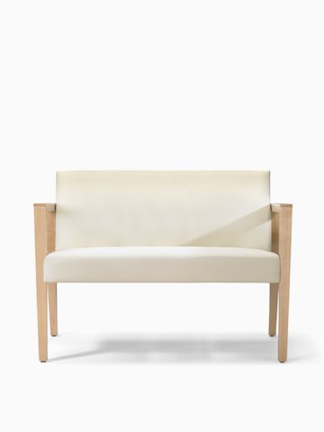 A front view of Brava 863 plus chair in white textile with open maple wood arms.