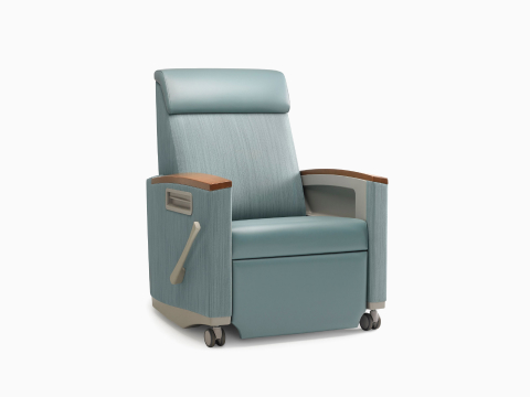 Nemschoff Consoul Recliner in a two-tone blue upholstery and dark wood armcaps. Nemschoff Consoul Recliner in a two-tone blue upholstery and dark wood armcaps.