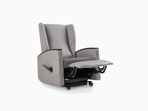 Culla Reclining Glider in gray patterned textile with gray textile seat and black solid surface arm caps, viewed at an angle.