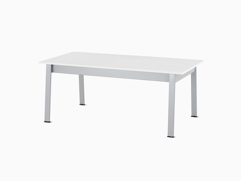 SAngled view of an Easton Coffee Table with a glacier white Corian top and metallic silver legs.