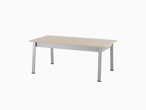Angled view of an Easton Coffee Table with a clear on ash laminate top and metallic silver legs. Angled view of an Easton Coffee Table with a clear on ash laminate top and metallic silver legs.
