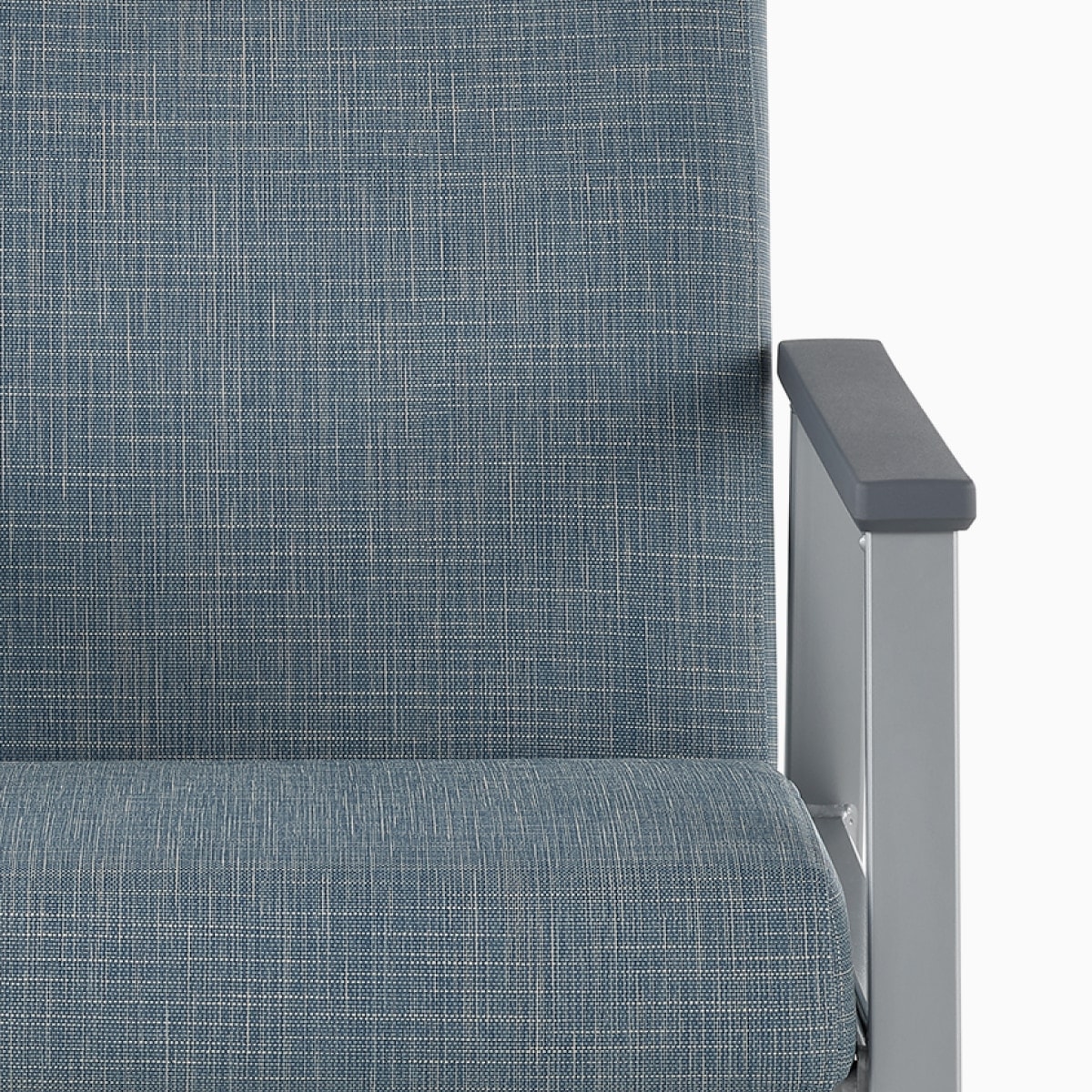 Front view of an Easton Side Chair with blue upholstery and slate gray arm caps.