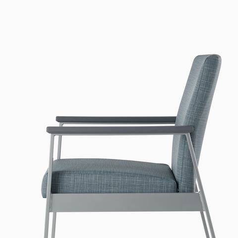 Side view of an Easton Easy Access Chair with blue upholstery, metallic silver four-leg base, and slate gray arm caps.