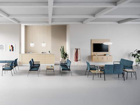 A waiting area setting with Easton Easy Access chairs, Side Chairs, Multiple Seating and Plus Chairs all in blue in various configurations.