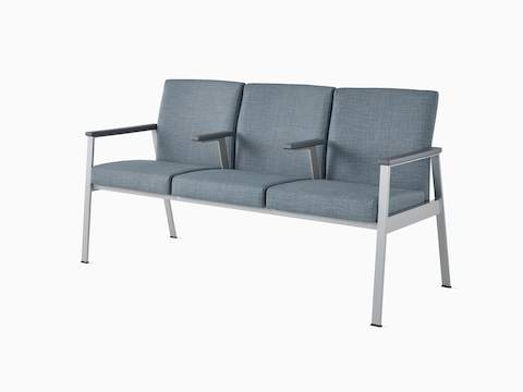 FFront angle view of Easton Multiple Seating with three seats, intervening arms, blue upholstery, metallic silver frame and grey arm caps.