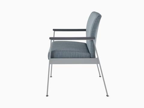 Side view of an Easton Plus Chair with blue upholstery, metallic four leg base and slate grey arm caps.