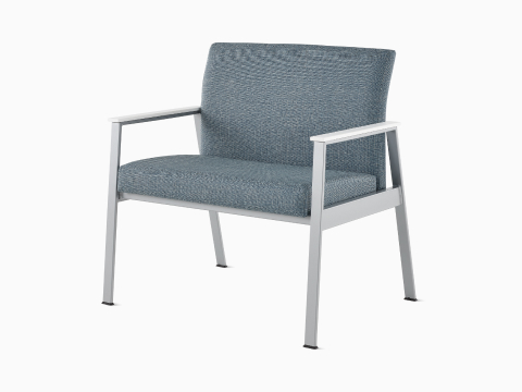 Front-angle view of an Easton Plus Chair with blue upholstery, metallic silver four-leg base, and glacier white Corian arm caps. Front-angle view of an Easton Plus Chair with blue upholstery, metallic silver four-leg base, and glacier white Corian arm caps.