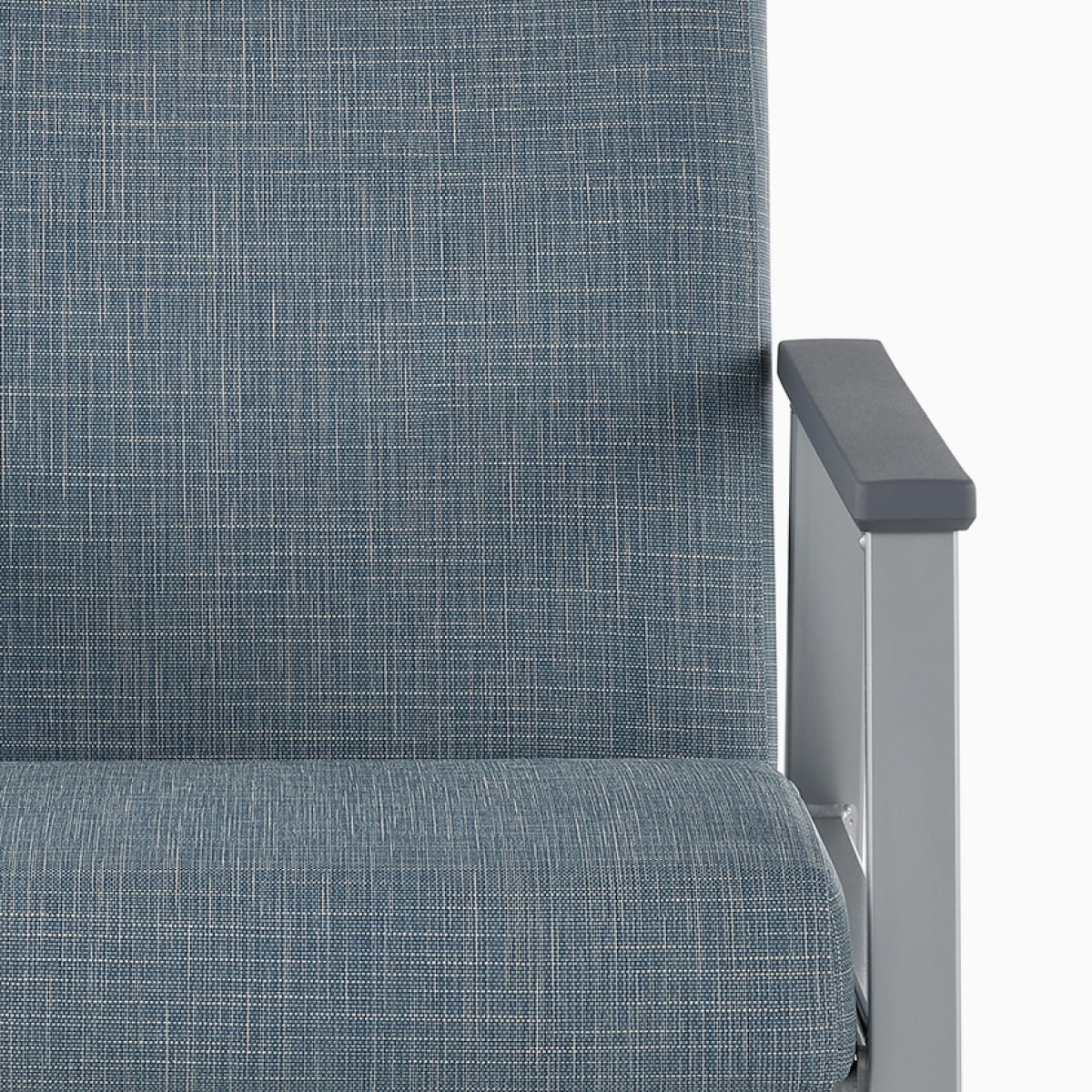 Front view of an Easton Side Chair with blue upholstery, metallic silver four-leg base, and slate gray arm caps.
