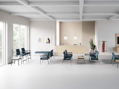 A waiting area setting with Easton Easy Access chairs, Side Chairs, Multiple Seating and Plus Chairs all in blue in various configurations.