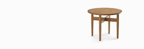 A round Hemlock end table in oak. A round Hemlock end table in oak.