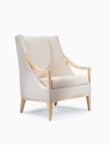 Angled view of Nemschoff Iris Lounge Chair in a cream upholstery with light wood arms, base, and legs.
