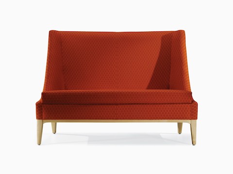 Nemschoff Iris Settee in a red upholstery and light wood base and legs, viewed from the front.