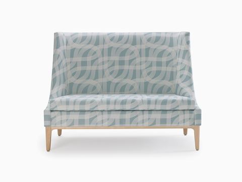 Nemschoff Iris Settee in light blue patterned upholstery and light wood base and legs, viewed from the front.