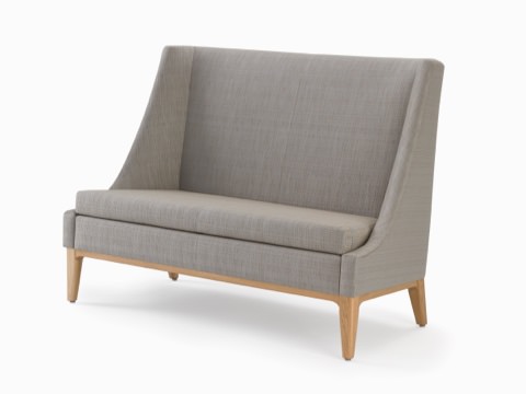 Nemschoff Iris Settee in a gray upholstery and light wood base and legs, viewed from the front.